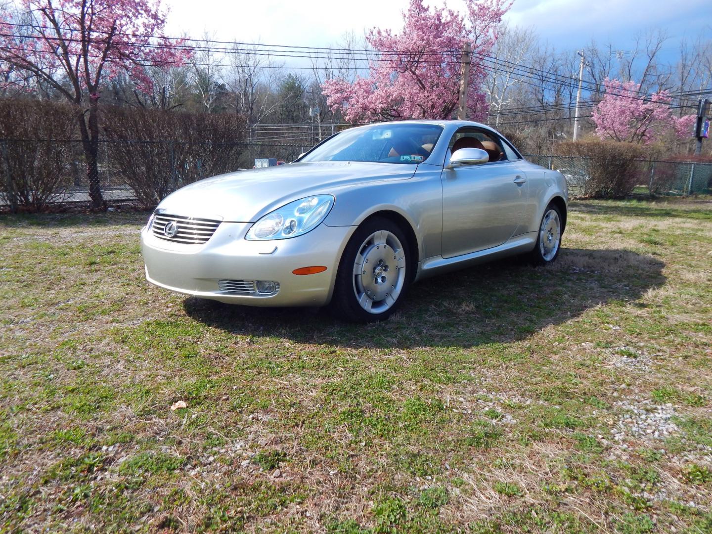 2005 Silver /Saddle Brown Leather Lexus SC 430 SC 430 (JTHFN48Y950) with an 4.3L V8 engine, Automatic transmission, located at 6528 Lower York Road, New Hope, PA, 18938, (215) 862-9555, 40.358707, -74.977882 - Here we have a beautiful Lexus SC 430 with only 53K original miles! Options include: 4.3L V8, Rear wheel drive, automatic transmission, saddle brown leather interior, wood trim, convertible top, AM/FM/TAPE/DISC radio with navigation, dual climate controls, heated front seats, cruise control, power t - Photo#0